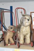 TWO PUSH-ALONG DOGS, both c.1960s and in well-loved playworn condition, with fur loss, minor damage,