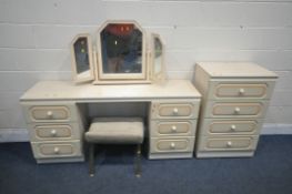 A MODERN CREAM BEDROOM SUITE, comprising a dressing table with six drawers, length 158cm x depth