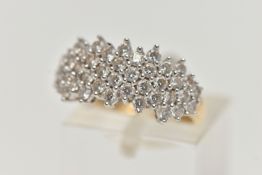 A 14CT GOLD CUBIC ZIRCONIA CLUSTER RING, circular cut cubic zirconia in a white metal setting, to