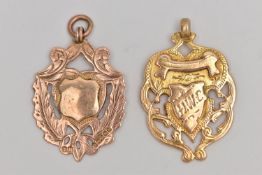 TWO 9CT GOLD MEDALLIONS, both of shield shape outline with pierced detail, both with 9ct
