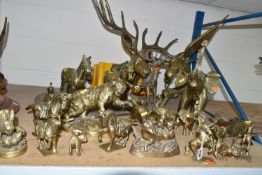 TWENTY-TWO BRASS ANIMAL ORNAMENTS AND SCULPTURES, to include a stags head approximately 30cm wide, a