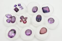 A BOX OF CUT GEMSTONES, various cut amethyst in protective capsules, to include oval, circular, pear