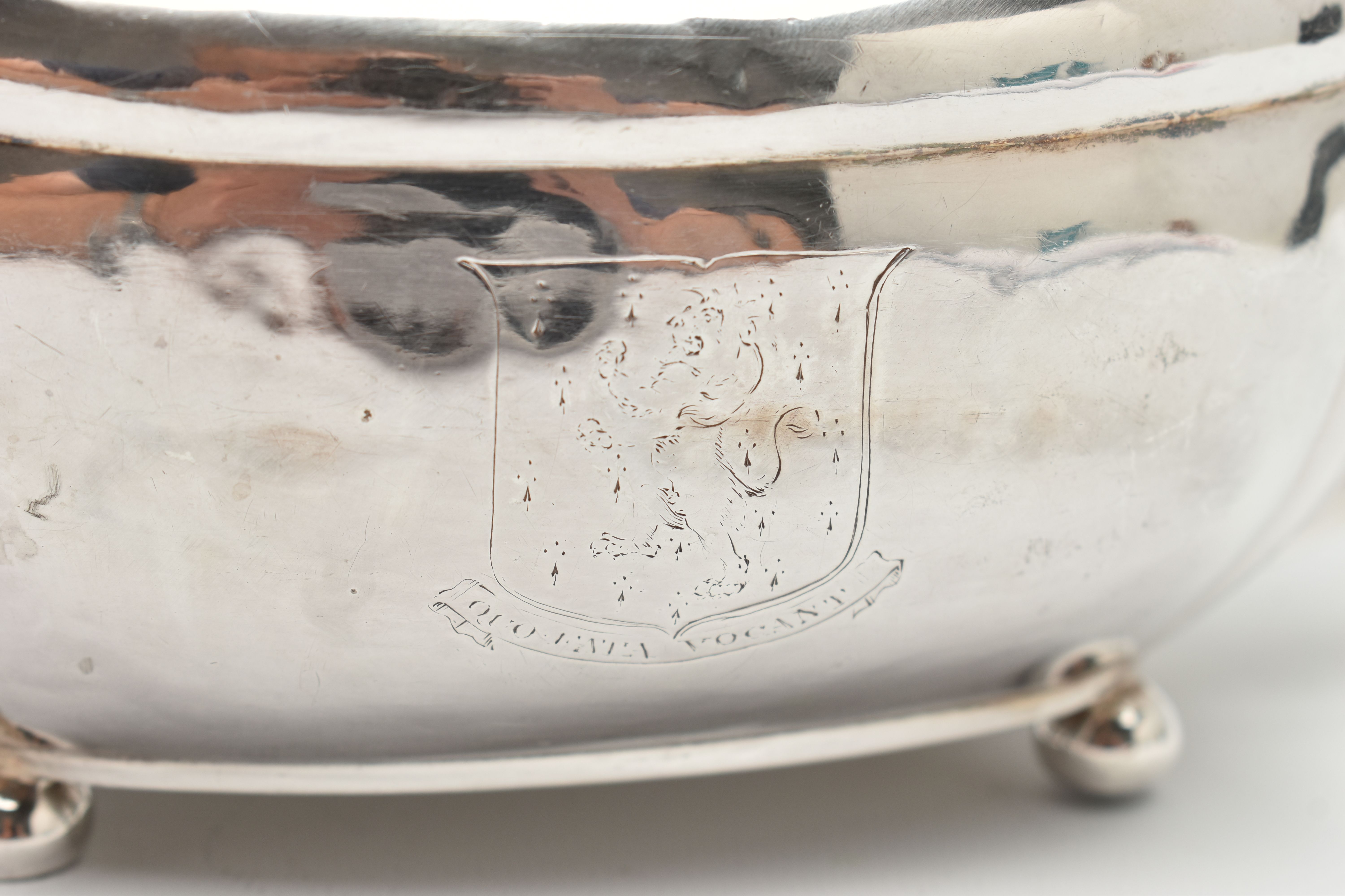 A GEORGE III SILVER TEAPOT, polished form, worn engraved crests to either side, on four ball feet, - Image 4 of 6