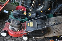 AN UNBRANDED 3.5HP PETROL LAWNMOWER, with a grass box, along with a Champion petrol lawnmower with