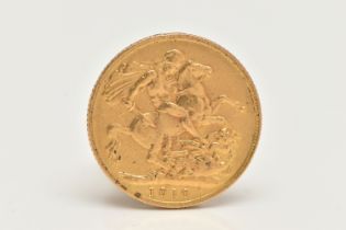 AN EDWARDIAN FULL SOVEREIGN GOLD COIN, obverse depicting Edward VII, reverse George and the Dragon