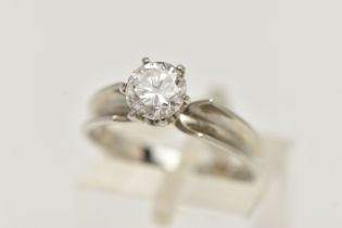 A WHITE METAL SINGLE STONE DIAMOND RING, round brilliant cut diamond in a six claw setting,