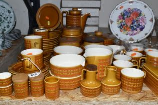 A HORNSEA SAFFRON DINNER SERVICE AND NINE ROYAL ALBERT COLLECTORS PLATES, comprising approximately