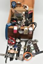 A WOODEN BOX WITH WATCHES, assorted ladies, gents and childrens fashion wristwatches (condition