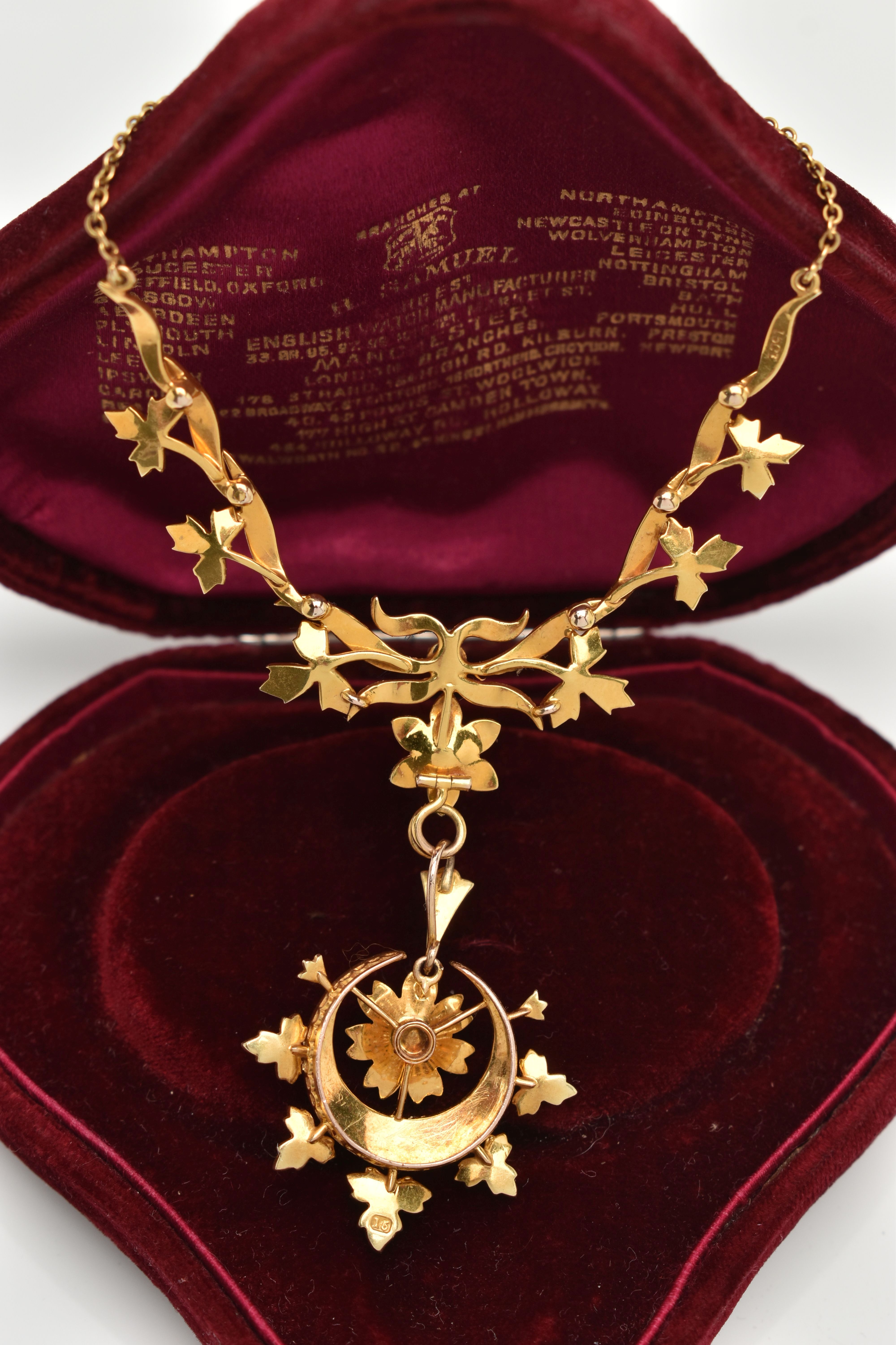 AN EARLY 20TH CENTURY GOLD AND SEED PEARL NECKLACE, a central floral piece leading on to branches - Image 6 of 6