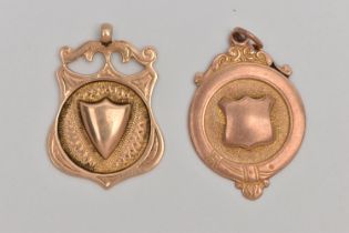 TWO EARLY 20TH CENTURY 9CT GOLD MEDALLIONS, one of circular outline the other of shield shape