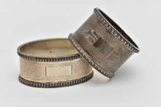 TWO SILVER NAPKIN RINGS, the first of a circular form, engine turned pattern with vacant