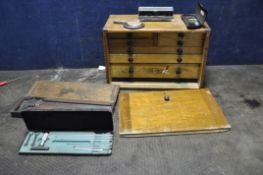 A MOORE AND WRIGHT ENGINEERS TOOL BOX, containing test and measuring equipment, with four short over