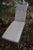 A HARTMAN FAUX RATTAN SUN LOUNGER, with an adjustable back and loose cushion (condition report: