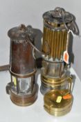 TWO BRASS MINERS LAMPS AND A BRASS COMPASS, one by The Industrial Rubber Products Co., London, the