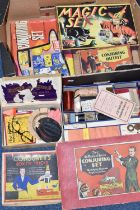 ONE BOX OF VINTAGE MAGIC SETS, dating from the 1920s onwards, to include a Conjurer's Box of Tricks,