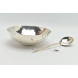 AN ELIZABETH II PLANISHED SILVER BOWL AND MATCHING LADLE, the bowl with domed base and the ladle