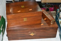 TWO WRITING BOXES AND A WOODEN PENCIL BOX, comprising a writing box with red velvet writing surface,