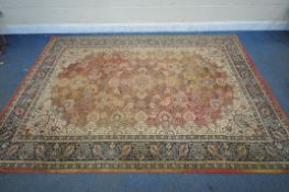 A WINDSOR RED AND CREAM GROUND RUG, with floral details, and a multistrip border, 200cm x 300cm (