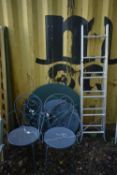 TWO CIRCULAR METAL GARDEN TABLE and two chairs, along with an aluminium step ladder (condition