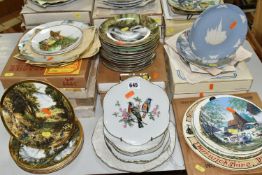 A QUANTITY OF COLLECTORS PLATES, SOME WITH BOXES, to include twelve 'The Forest year' plates by John