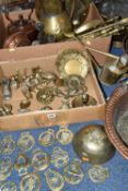 TWO BOXES OF COPPER AND BRASSWARE, to include a brass chamber stick, horse brasses and ornaments,