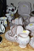 A TUSCAN CHINA TEA SET, a gilt edged pink and grey tulip design on a pink ground, comprising two