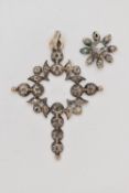 A DIAMOND SET CROSS PENDANT, set with flat cut diamonds, with separate flower shape diamond set