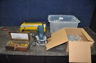 A BLACK AND DECKER KW780 1/4in ROUTER with attachments and original box, a box of router bits and an