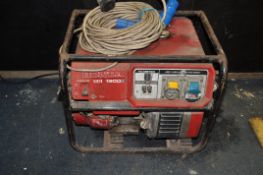 A HONDA EB1900X PORTABLE GENERATOR 115v and 240v with 240v extension lead (engine pulls freely,