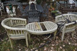 A PAIR OF WEATHERED TEAK BANANA ARMCHAIRS, and a matching table (condition report: weathered, no
