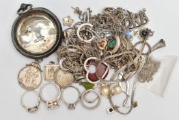 A BAG OF ASSORTED JEWELLERY, to include a tangled yellow metal trace chain with spring clasp stamped