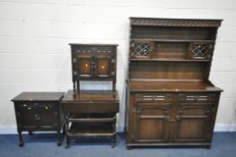 A 20TH CENTURY OAK DRESSER, the top with a three tier plate rack and two lead glazed doors, the base