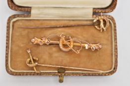TWO EARLY 20TH CENTURY STICKPINS AND A BROOCH, all of equestrian related design, the brooch with 9ct