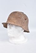 A WWI ERA GERMAN BATTLE DAMAGED HELMET, this has damage to the top in two places and has some