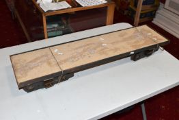 A 5 INCH (127MM) GAUGE BOGIE FLAT WAGON, appears scratchbuilt, two four wheel bogies under a steel