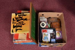 A QUANTITY OF ASSORTED BOXED GAMES AND PUZZLES, assorted vintage board games to include early