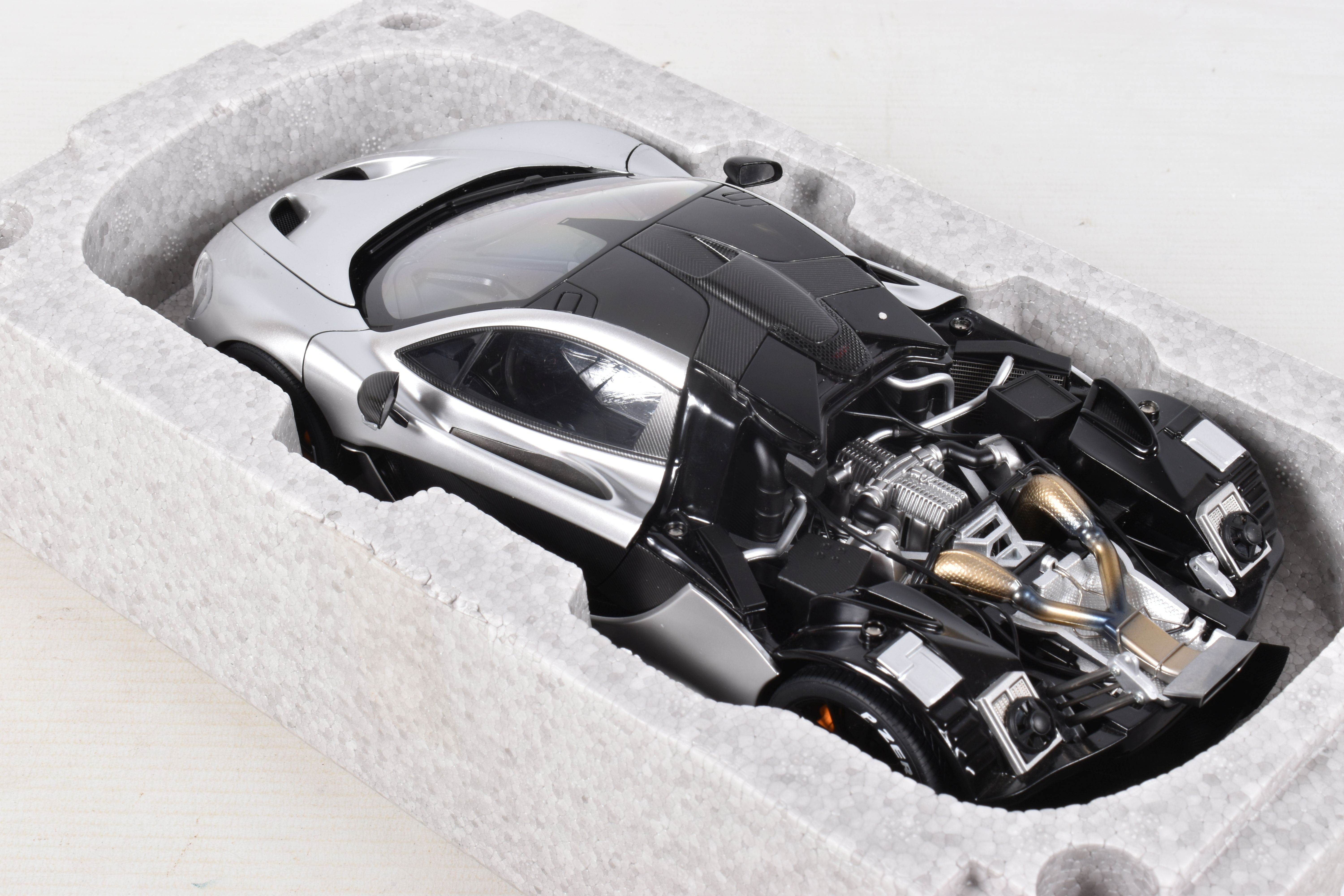A BOXED AUTOART SIGNATURE MODEL MCLAREN P1, 1:18 scale, numbered 76026 in matt chrome, appears in - Image 5 of 8