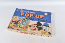 A BOXED CHAD VALLEY DISNEYLAND POP-UP RACE GAME, c.1950's, missing dice but otherwise appears