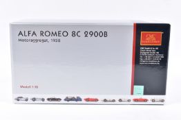 A BOXED CMC ALFA ROMEO 8C 2900B MOTORAGGREGAT 1938 1:18 SCALE MODEL, numbered M-131, appears in