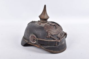 A WWI ERA IMPERIAL GERMANY PICKLEHAUBE HELMET COMPLETE WITH HELMET PLATE, the line and chin strap