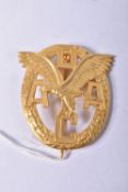 A GERMAN THIRD REICH ADAC BADGE IN GOLD, this is an Allegmiener Deutscher Automobile club badge,