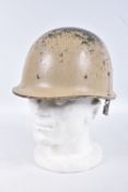 AN IRAQI M80 HELMET WITH LINER, these helmets were overpainted for camouflage and like the