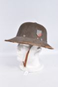 A 1942 DATED GERMAN ARIKACORPS PITH HELMET WITH DECALS, this is the olive green tropical sun hat