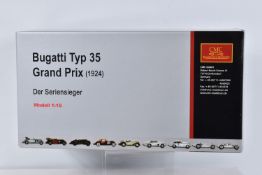 A BOXED CMC BUGATTI TYP 35 GRAND PRIX 1924 1:18 SCALE MODEL, numbered M-063, blue body appears in