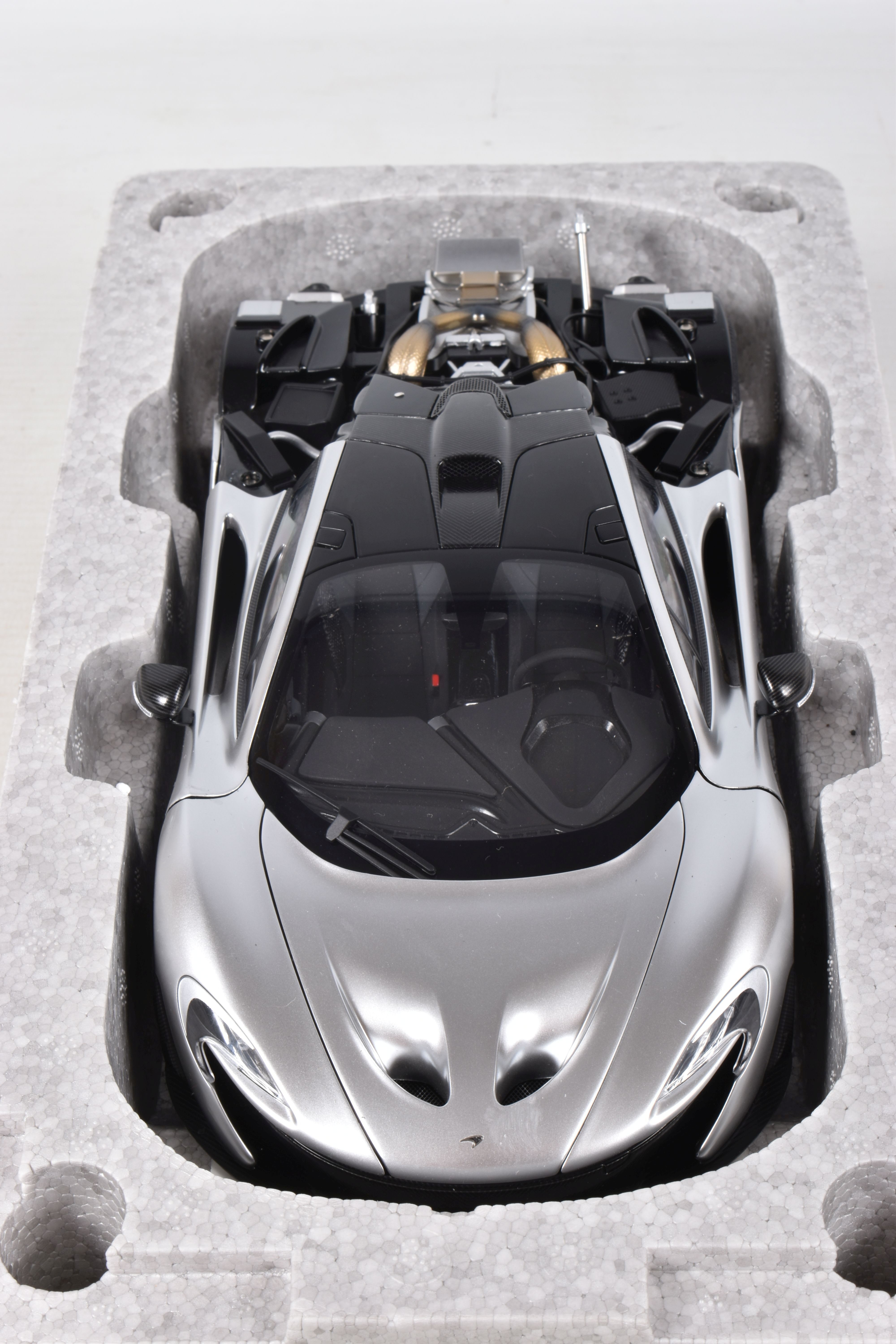 A BOXED AUTOART SIGNATURE MODEL MCLAREN P1, 1:18 scale, numbered 76026 in matt chrome, appears in - Image 6 of 8