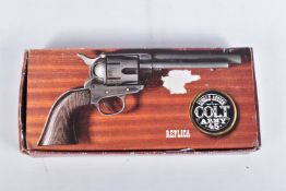 A BOXED KOLSER REPLICA SINGLE ACTION COLT ARMY 45 REVOLVER, complete with six dummy shells,