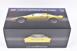 A BOXED KYOSHO LANCIA STRATOS HF WIDE WHEEL 1:18 SCALE MODEL VEHICLE, numbered 08137Y, in yellow