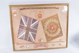 A 1911 FRAMED SILK AND EMBROIDERY NORTHUMBERLAND FUSILIER SAMPLER, this is predominantly gold and
