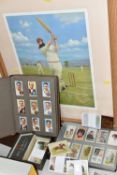 TWO CIGARETTE CARD ALBUMS AND A BOX OF CIGARETTE CARDS containing a miscellaneous collection of