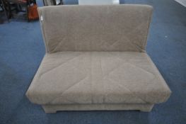 A MODERN BROWN UPHOLSTERED FUTON, length 126cm x depth 98cm x height 84cm (condition report: in need